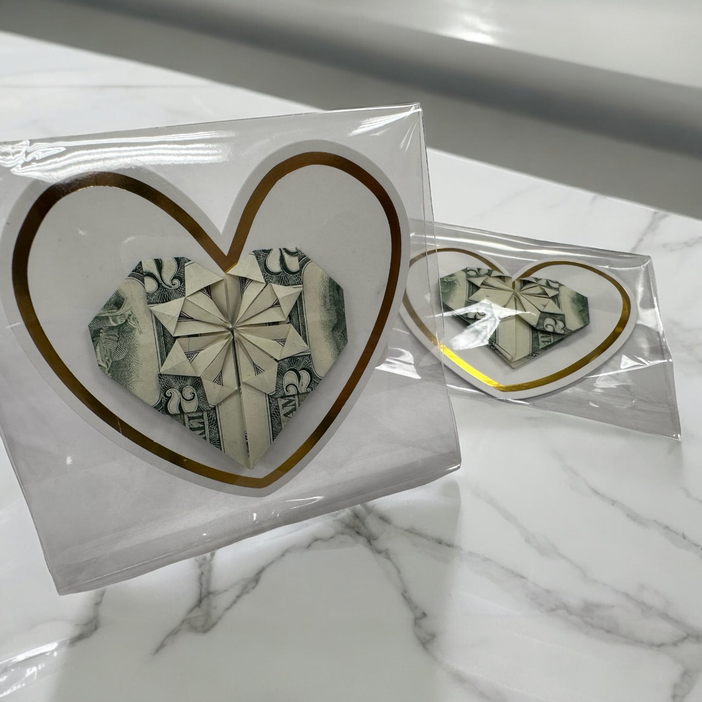 MONEY ART: Origami Heart made with REAL MONEY $2 Bill (White & Gold Trim background)